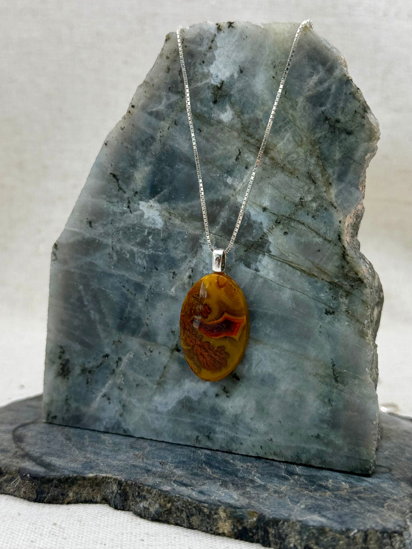 Enduring Light — Warring States Plume Agate Pendant