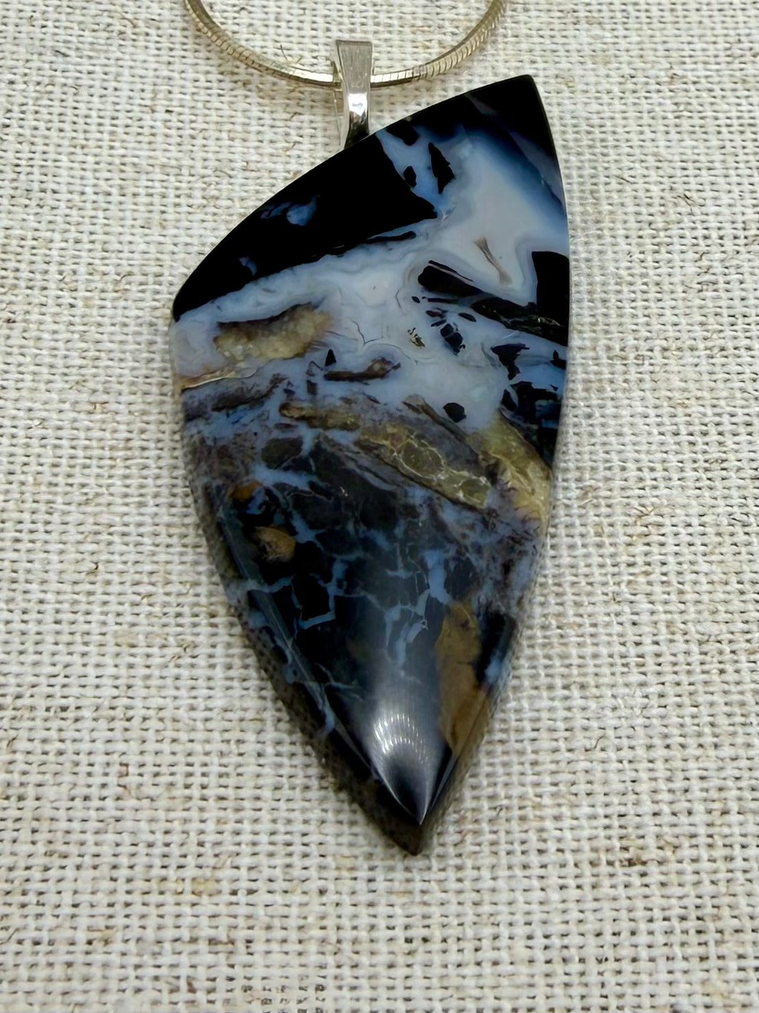 Ancient Roots – Tom Miner Agatized Wood Stone Pendant